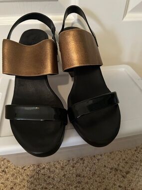 THE FLEXX Black and Bronze Wide Strap Slingback Sandals